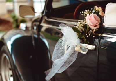 Flower on handle of retro car Flower on handle of retro car